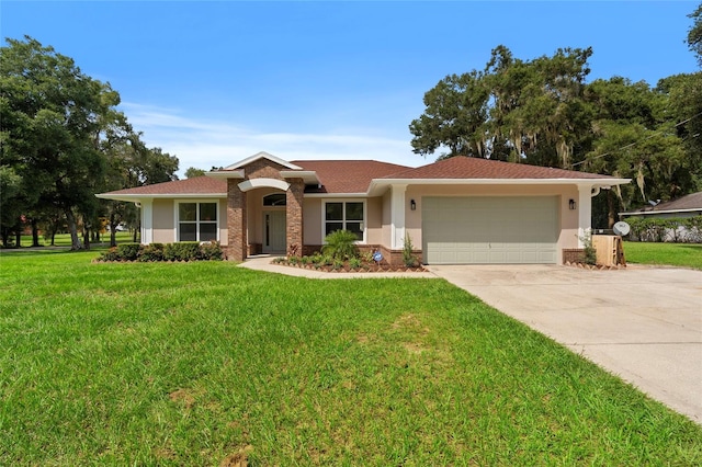 single story home with a front yard and a garage