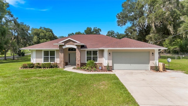 ranch-style house with a front yard and a garage