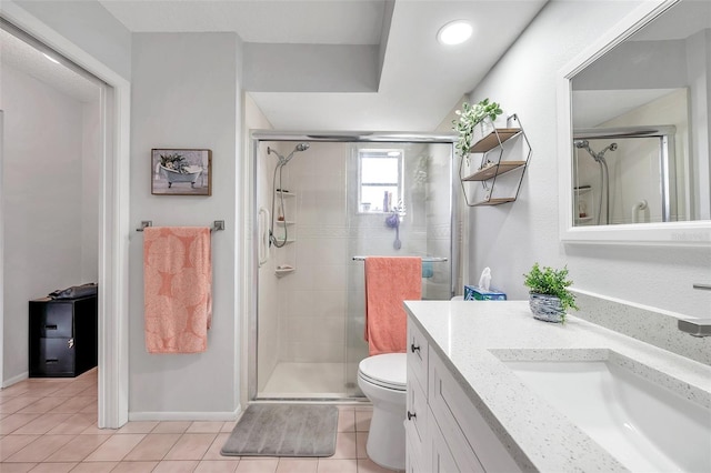 bathroom with an enclosed shower, tile patterned floors, vanity, and toilet