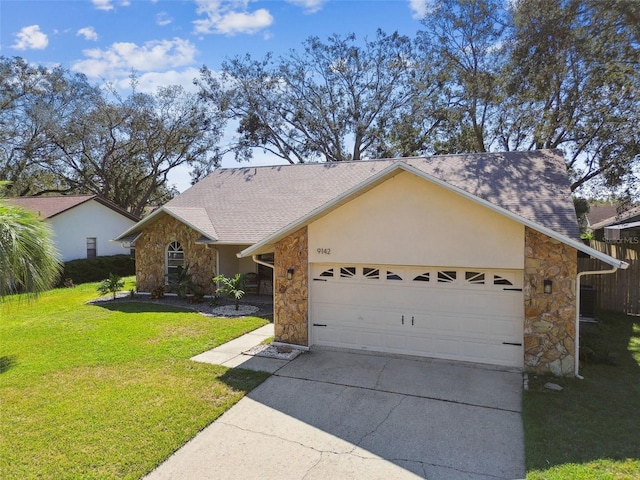 ranch-style home featuring a garage and a front lawn