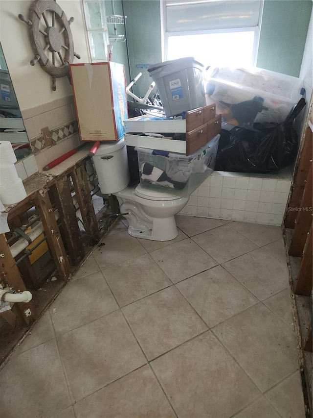 bathroom featuring tile patterned floors and toilet