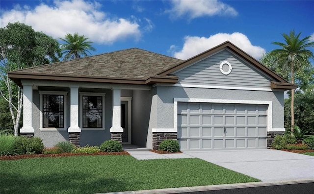 view of front facade with a front yard and a garage