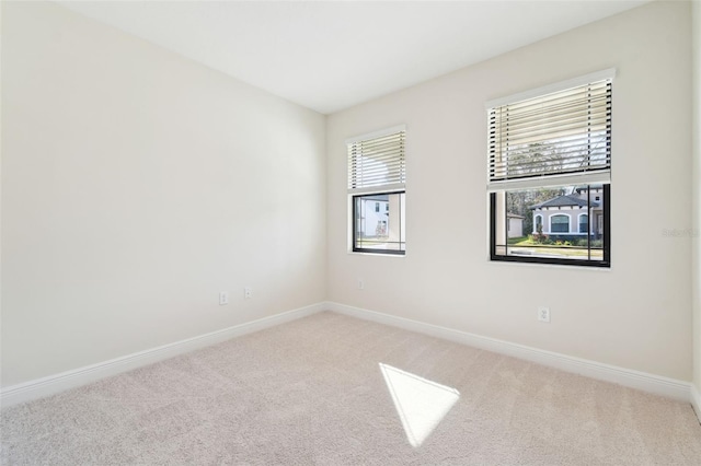 view of carpeted spare room