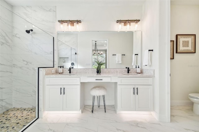 11313 Limpkin Rd, Weeki Wachee, FL 34614 - bathroom featuring marble look tiles, a marble finish shower, toilet, and double vanity