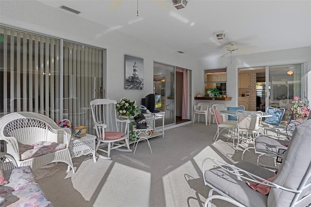 view of patio / terrace featuring ceiling fan