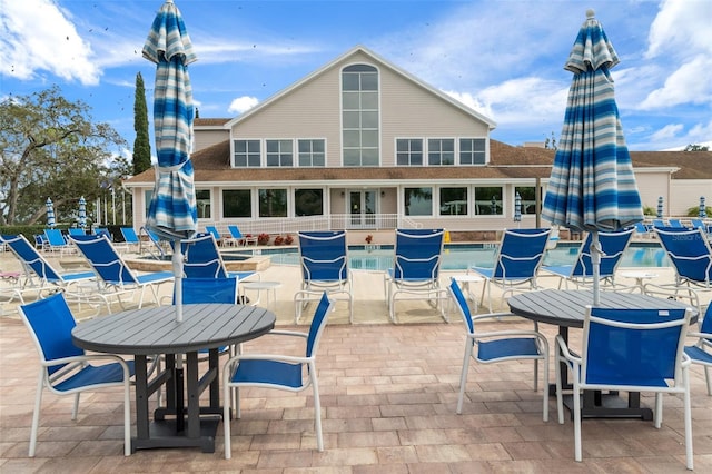 view of patio featuring a community pool