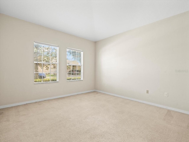 4264 Braemere Dr, Spring Hill, FL 34609 - unfurnished room with light carpet and baseboards
