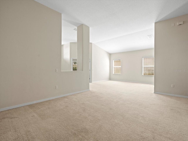 4264 Braemere Dr, Spring Hill, FL 34609 - spare room featuring carpet flooring and baseboards