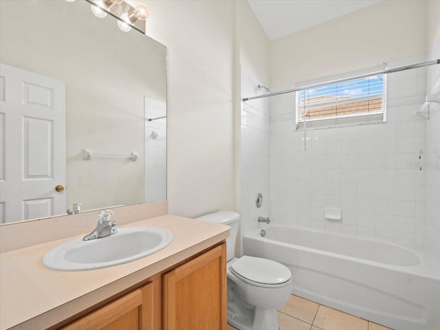 4264 Braemere Dr, Spring Hill, FL 34609 - full bathroom featuring toilet, vanity, tile patterned floors, and bathing tub / shower combination