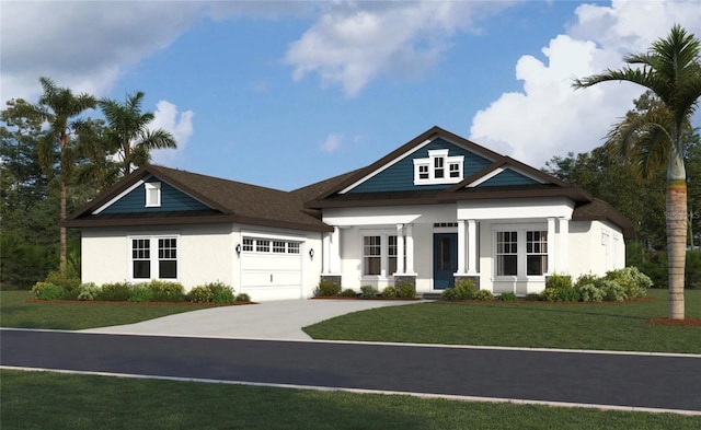 view of front of house with a front yard and a garage