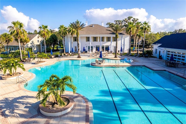 view of pool featuring a patio area