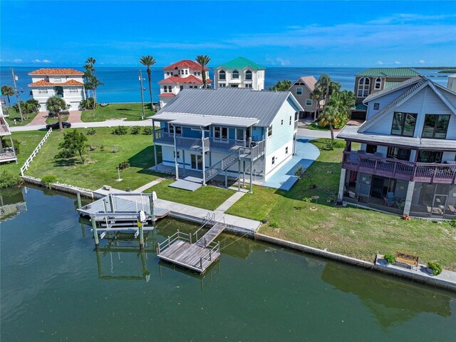 bird's eye view with a water view