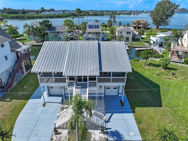 bird's eye view with a water view