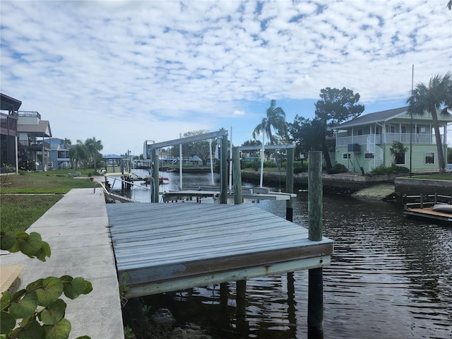 dock area with a water view