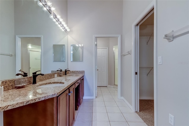 bathroom with vanity and tile patterned floors