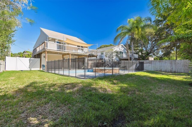 view of yard featuring a fenced in pool