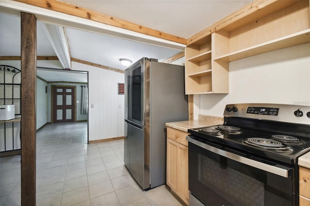 kitchen with light tile patterned flooring, appliances with stainless steel finishes, light brown cabinetry, wooden walls, and lofted ceiling with beams