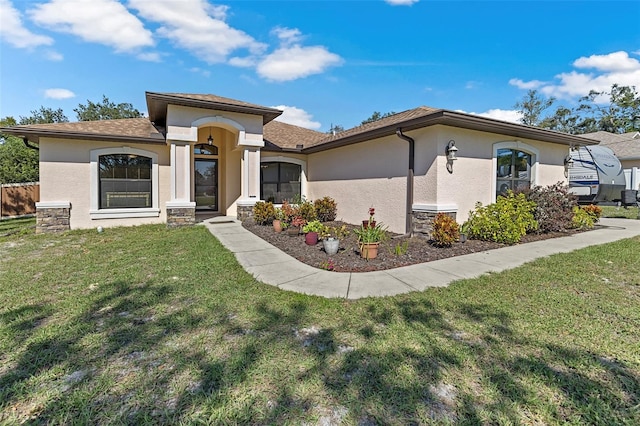 view of front of property with a front yard