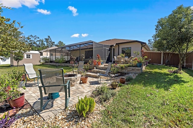 exterior space featuring a patio, glass enclosure, and a lawn