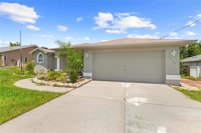 ranch-style home featuring a garage