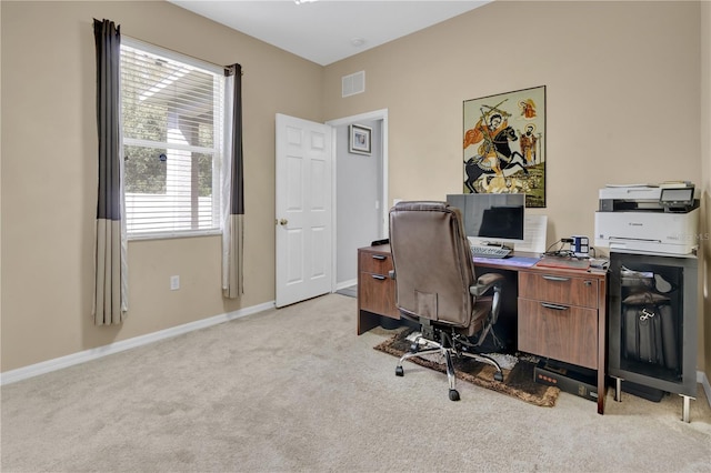 carpeted office space featuring a wealth of natural light