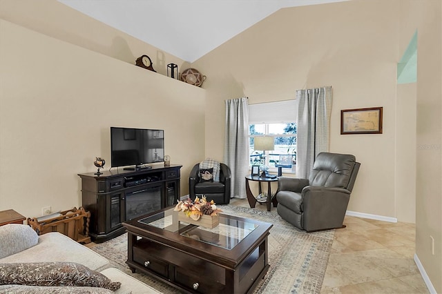 living room with high vaulted ceiling