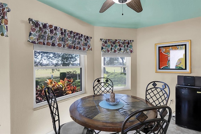 dining area with ceiling fan