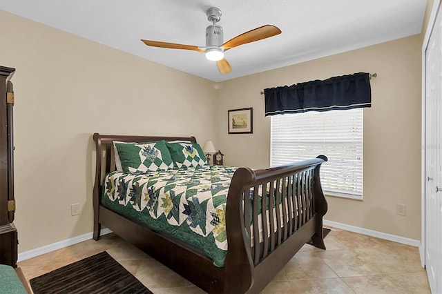 bedroom with light tile patterned floors and ceiling fan