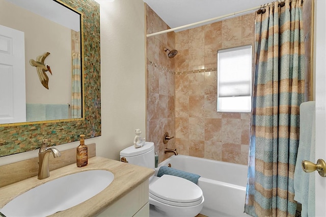 full bathroom with toilet, shower / bath combo with shower curtain, and vanity