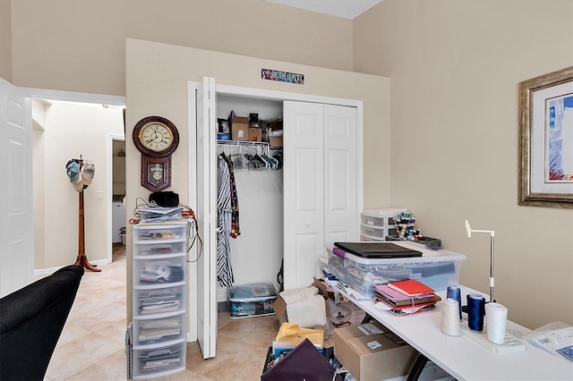 tiled bedroom featuring a closet