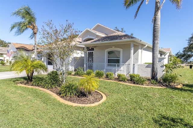 view of front of home with a front lawn