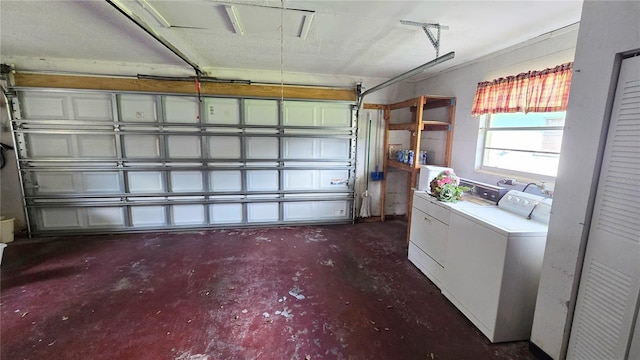 garage featuring independent washer and dryer