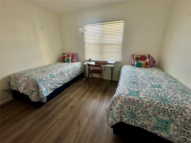 bedroom featuring wood-type flooring