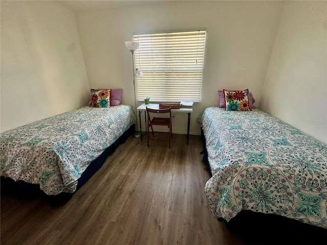 bedroom with wood-type flooring