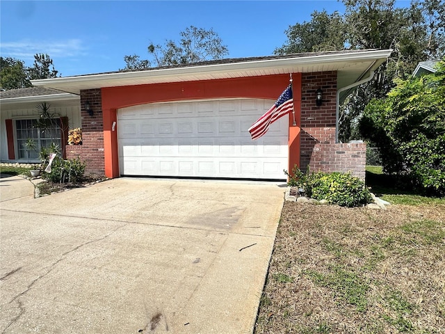 ranch-style home featuring a garage