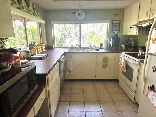 kitchen featuring sink, ventilation hood, a wealth of natural light, and white range with electric stovetop