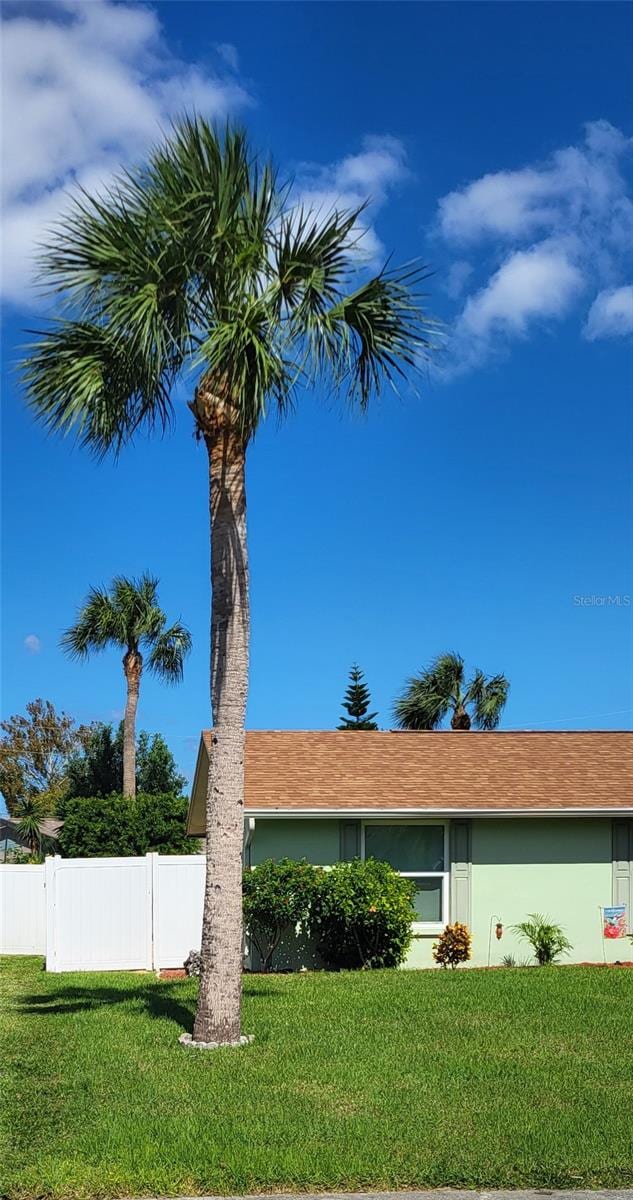 exterior space with a front lawn