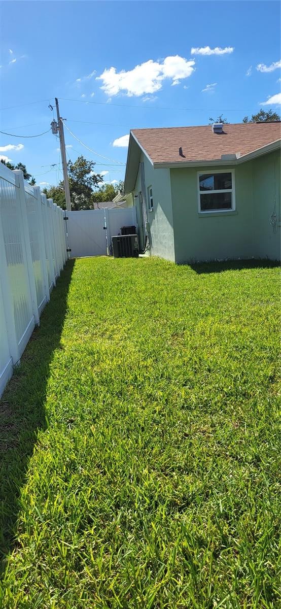 view of yard with cooling unit