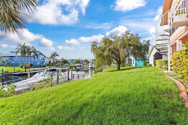 view of yard featuring a boat dock