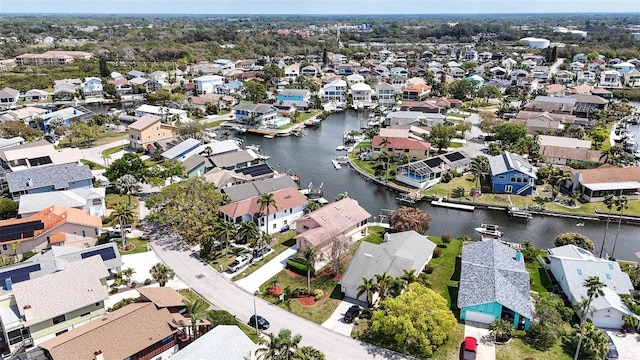 aerial view with a residential view and a water view