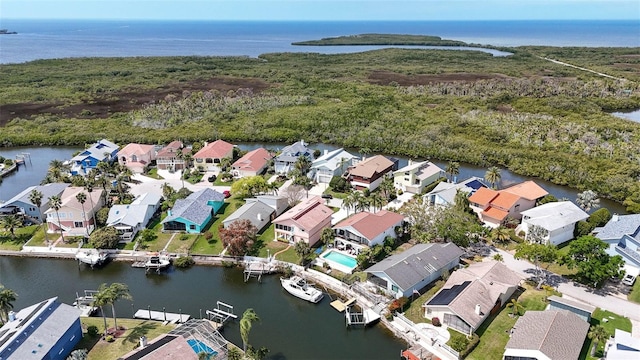 aerial view featuring a residential view and a water view