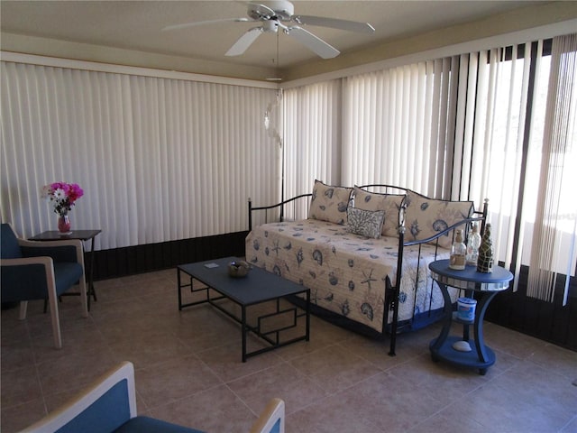 bedroom featuring tile patterned flooring and ceiling fan