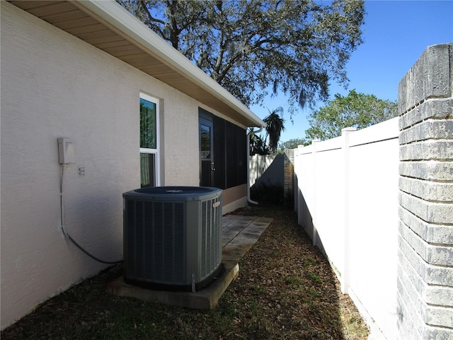 view of yard featuring central AC unit