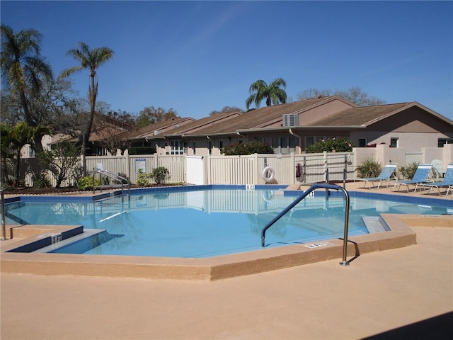 view of pool featuring a patio