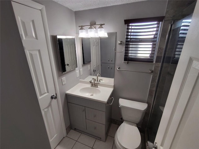 full bathroom featuring walk in shower, toilet, a textured ceiling, vanity, and tile patterned flooring