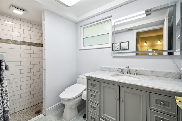 bathroom with vanity, curtained shower, toilet, and tile patterned floors