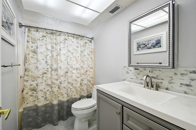 full bathroom with tasteful backsplash, shower / tub combo, a textured ceiling, toilet, and vanity