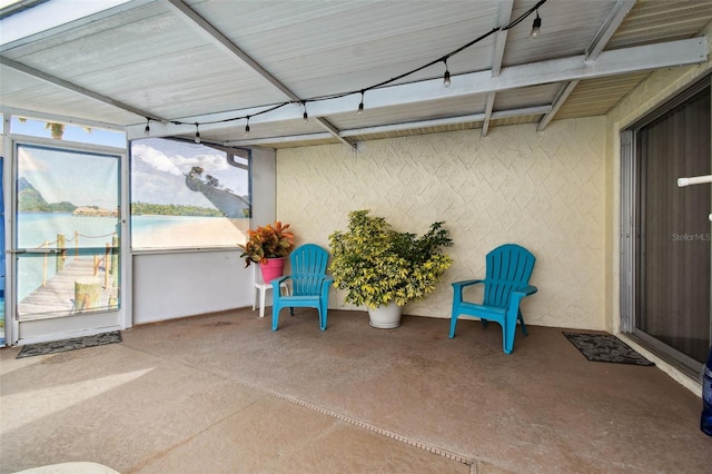 view of patio / terrace with a water view