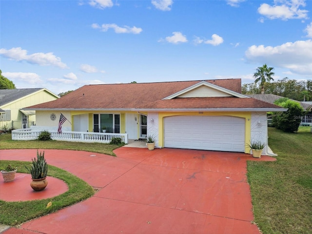 ranch-style home with a front yard, covered porch, and a garage