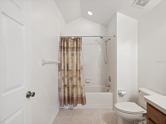 full bathroom featuring shower / tub combo, vaulted ceiling, toilet, vanity, and tile patterned flooring